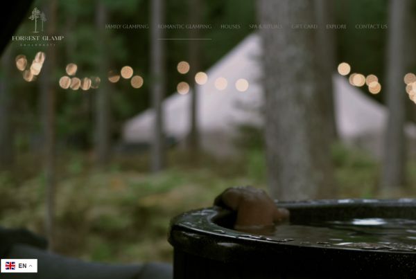 Forest Glamp website homepage with booking system.